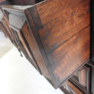 Lot 15 - A large late 17th century oak chest, in two...