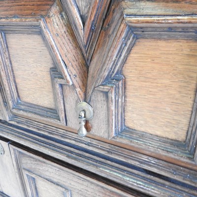 Lot 15 - A large late 17th century oak chest, in two...