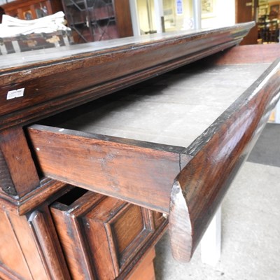 Lot 15 - A large late 17th century oak chest, in two...