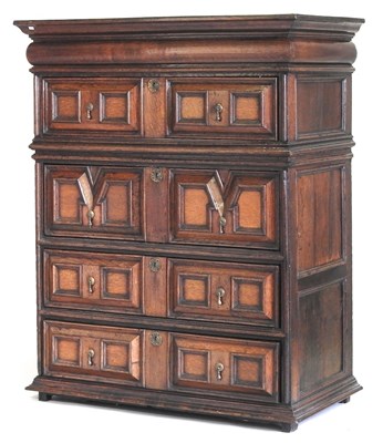 Lot 15 - A large late 17th century oak chest, in two...