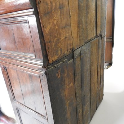 Lot 15 - A large late 17th century oak chest, in two...
