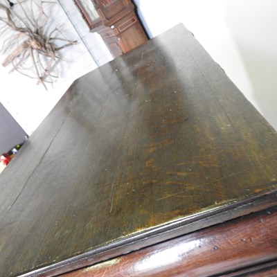 Lot 15 - A large late 17th century oak chest, in two...