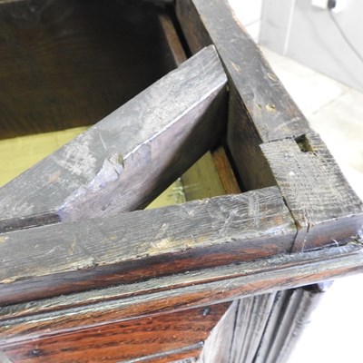 Lot 15 - A large late 17th century oak chest, in two...