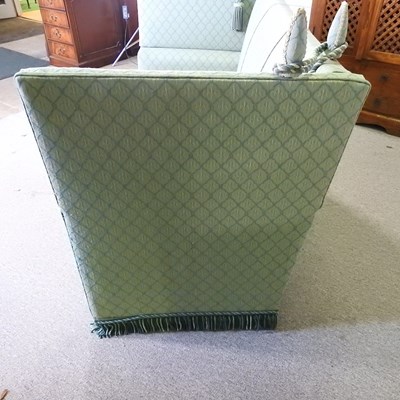 Lot 57 - A mid 20th century green upholstered drop end...