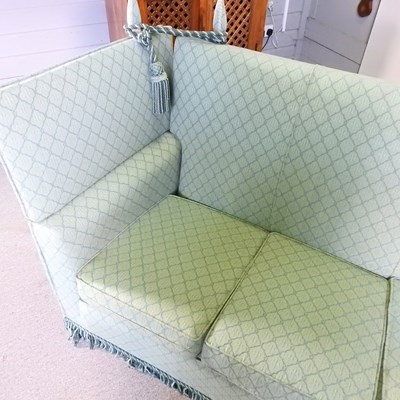 Lot 57 - A mid 20th century green upholstered drop end...