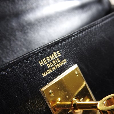 Lot 55 - An Hermes Kelly handbag, 2000, in black...