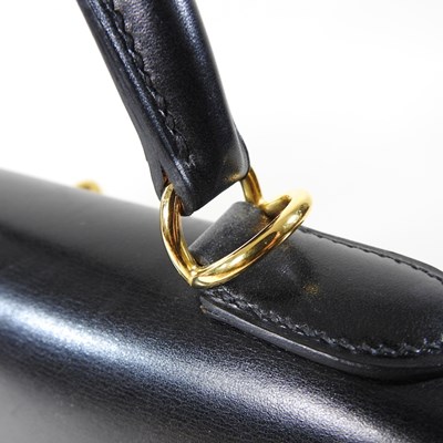 Lot 55 - An Hermes Kelly handbag, 2000, in black...
