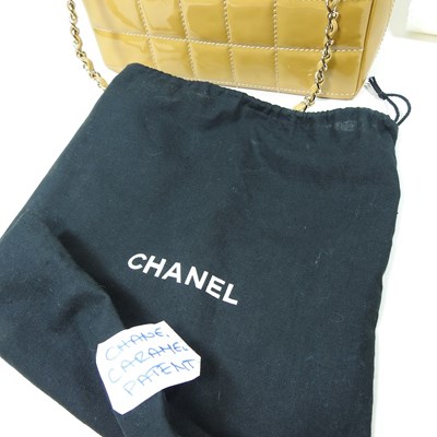Lot 4 - A Chanel Choco Bar clutch bag, in caramel...