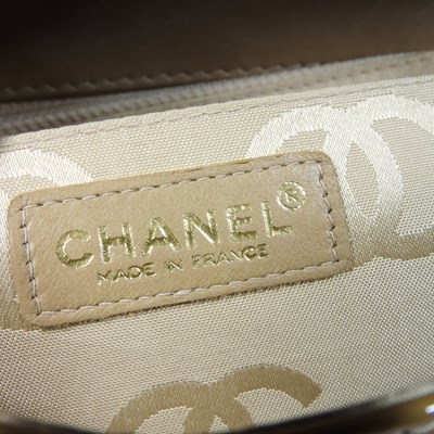 Lot 4 - A Chanel Choco Bar clutch bag, in caramel...