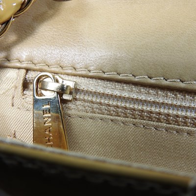 Lot 4 - A Chanel Choco Bar clutch bag, in caramel...