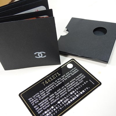 Lot 4 - A Chanel Choco Bar clutch bag, in caramel...