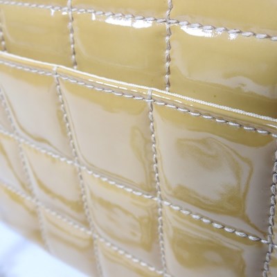 Lot 4 - A Chanel Choco Bar clutch bag, in caramel...