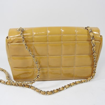 Lot 4 - A Chanel Choco Bar clutch bag, in caramel...