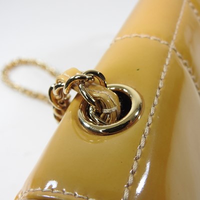 Lot 4 - A Chanel Choco Bar clutch bag, in caramel...
