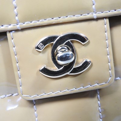 Lot 4 - A Chanel Choco Bar clutch bag, in caramel...