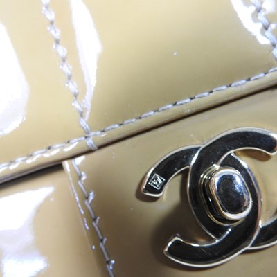 Lot 4 - A Chanel Choco Bar clutch bag, in caramel...