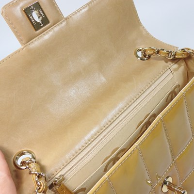 Lot 4 - A Chanel Choco Bar clutch bag, in caramel...