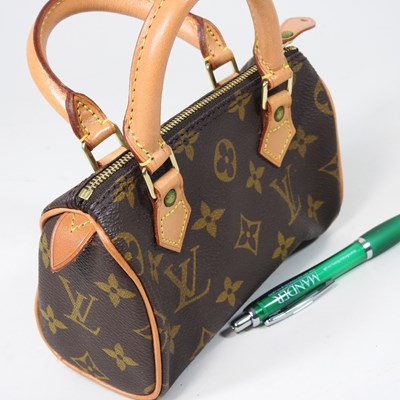 Lot 12 - A Louis Vuitton Nano Speedy handbag, in...