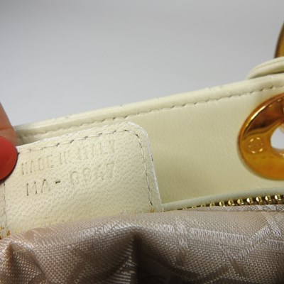 Lot 50 - A Christion Dior medium Lady Dior handbag, in...