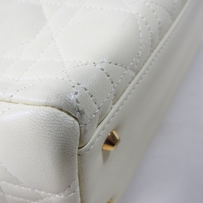 Lot 50 - A Christion Dior medium Lady Dior handbag, in...