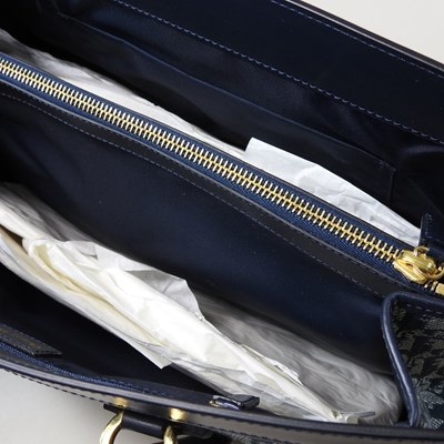 Lot 38 - A Christian Dior Trotter tote bag, in navy...