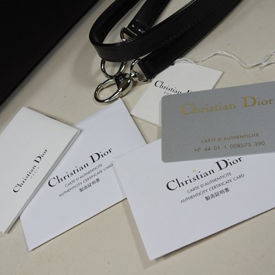Lot 28 - A Christian Dior medium Lady Dior bag, in dark...