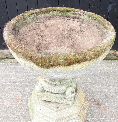 Lot 25 - A large cast stone garden font, of circular...