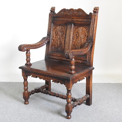 Lot 389 - A 17th century style carved oak throne chair,...
