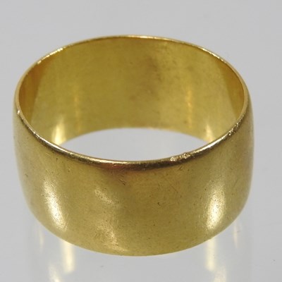 Lot 2 - A 22 carat gold wedding band, 12g, size V