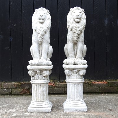 Lot 111 - A pair of cast stone garden models of lions,...