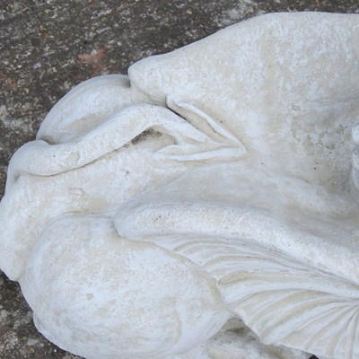 Lot 63 - A cast stone garden model of a dragon, 47cm high