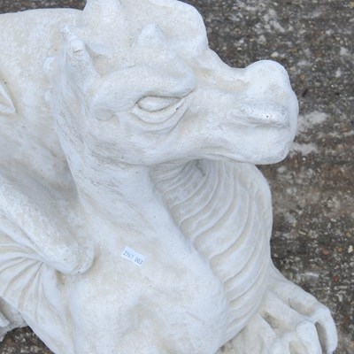 Lot 63 - A cast stone garden model of a dragon, 47cm high