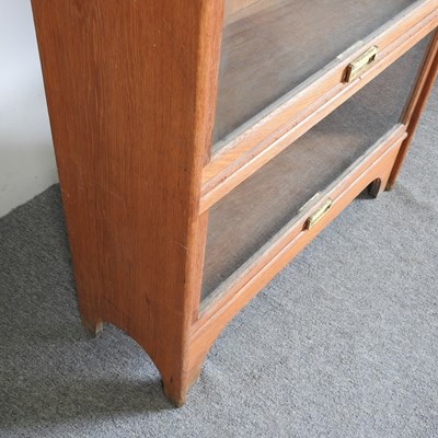 Lot 115 - An early 20th century Globe Wernicke style...