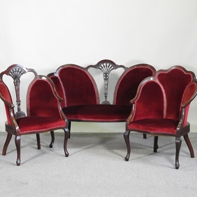 Lot 550 - An Edwardian maroon upholstered salon suite,...