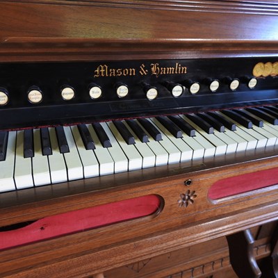 Lot 82 - A Victorian walnut cased chapel organ, by...
