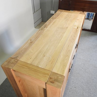 Lot 163 - A modern light oak sideboard