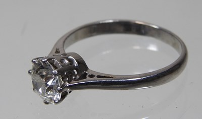Lot 30 - An 18 carat white gold solitaire diamond ring,...