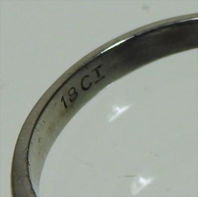 Lot 30 - An 18 carat white gold solitaire diamond ring,...