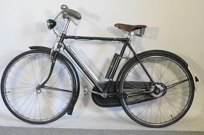 Lot 121 - A 1950's Raleigh gentleman's bicycle, together...