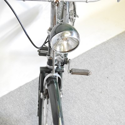 Lot 121 - A 1950's Raleigh gentleman's bicycle, together...