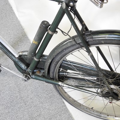 Lot 121 - A 1950's Raleigh gentleman's bicycle, together...