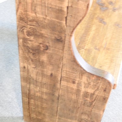 Lot 39 - A hand made pine pew, with a panelled back and...