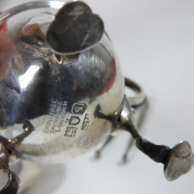Lot 55 - An early 20th century sliver cream jug,...