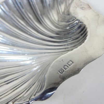Lot 55 - An early 20th century sliver cream jug,...