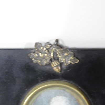 Lot 20 - English School, 19th century, a miniature head...