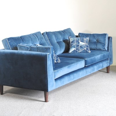 Lot 393 - A Sofology blue velvet upholstered sofa, with...