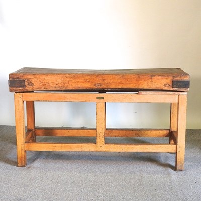 Lot 175 - A large antique butcher's block, on a pine...