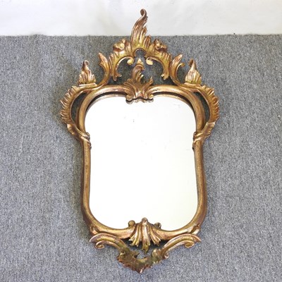 Lot 567 - A small giltwood Florentine style wall mirror,...