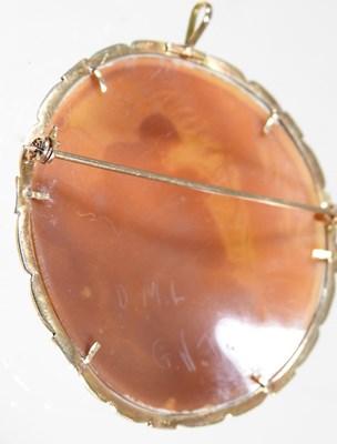 Lot 65 - A cameo brooch, of circular shape, carved with...