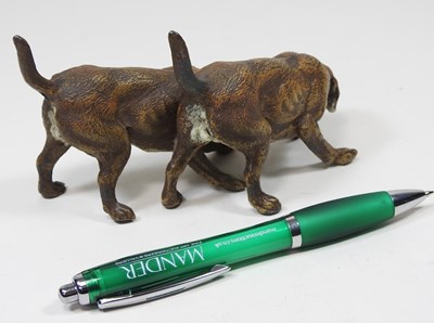 Lot 18 - A 19th century painted metal model of two...